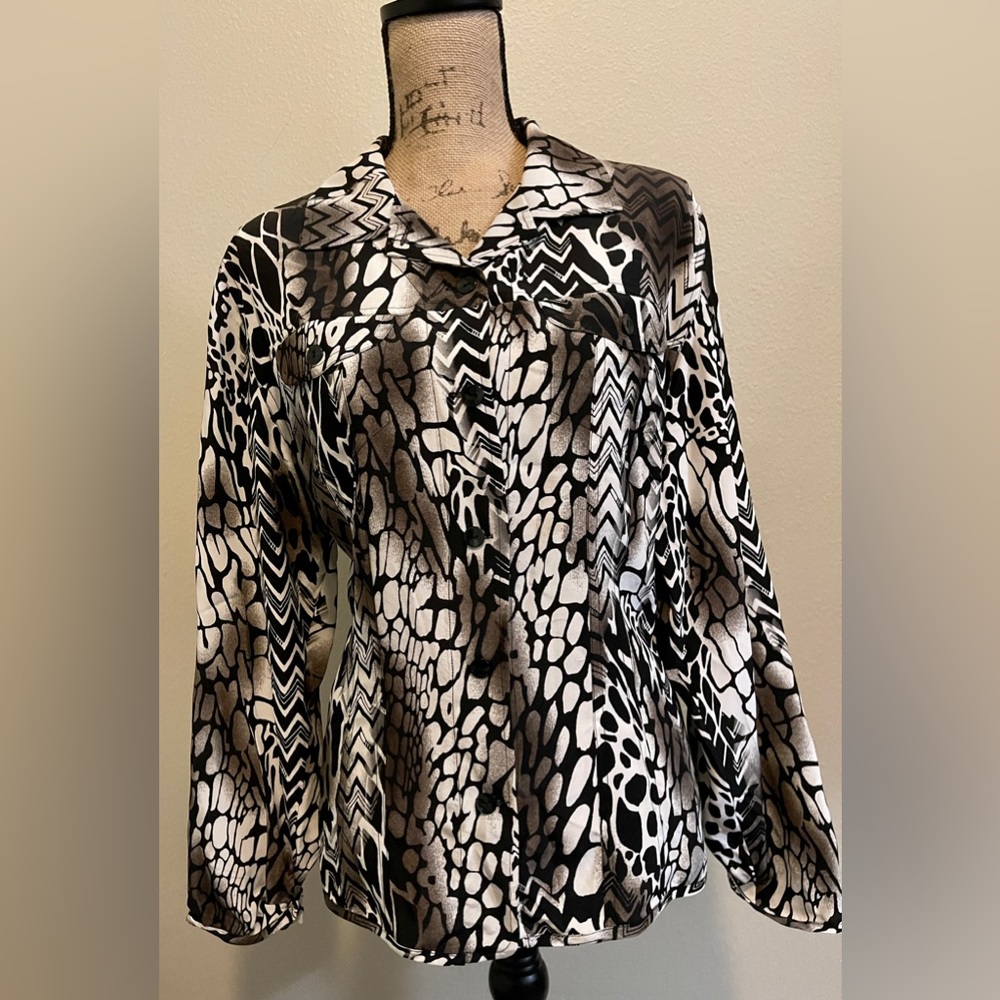 Chico’s.    Size 2.    Black and white top.